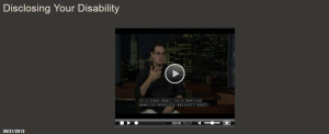 Screenshot of video including a man using sign language