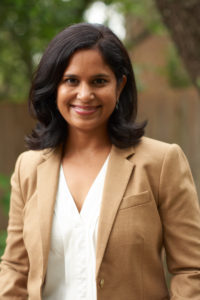 Image of Suchitra in a tan blazer