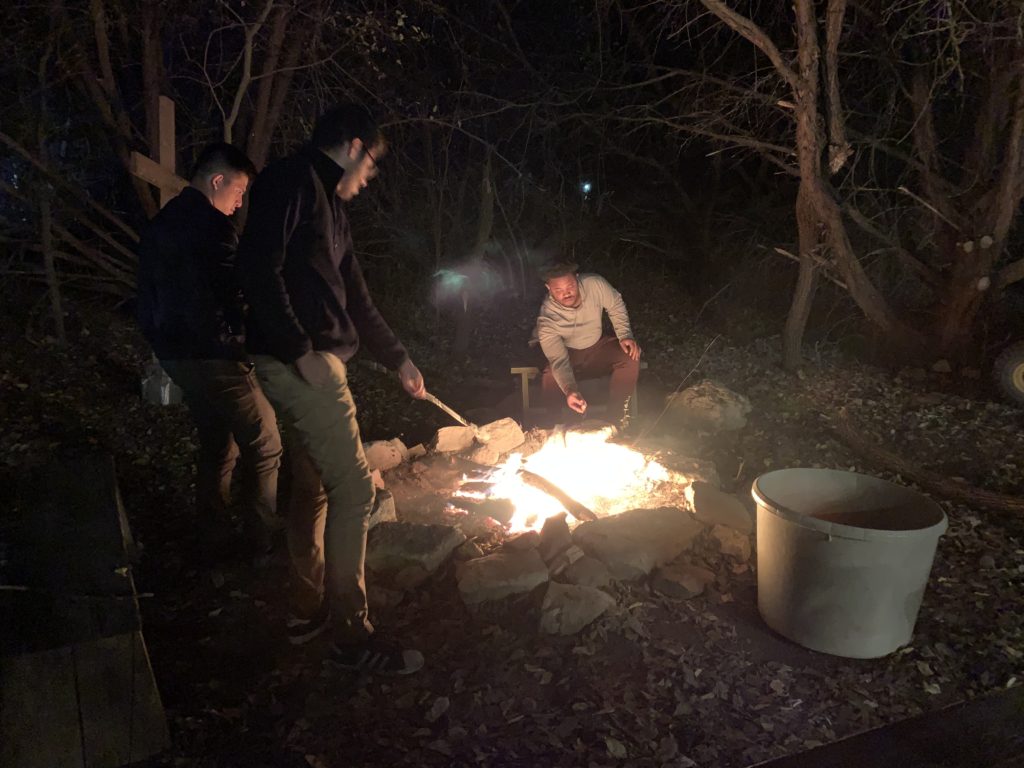 Product Prodigy students around the campfire