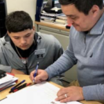 Mentor helping student with homework