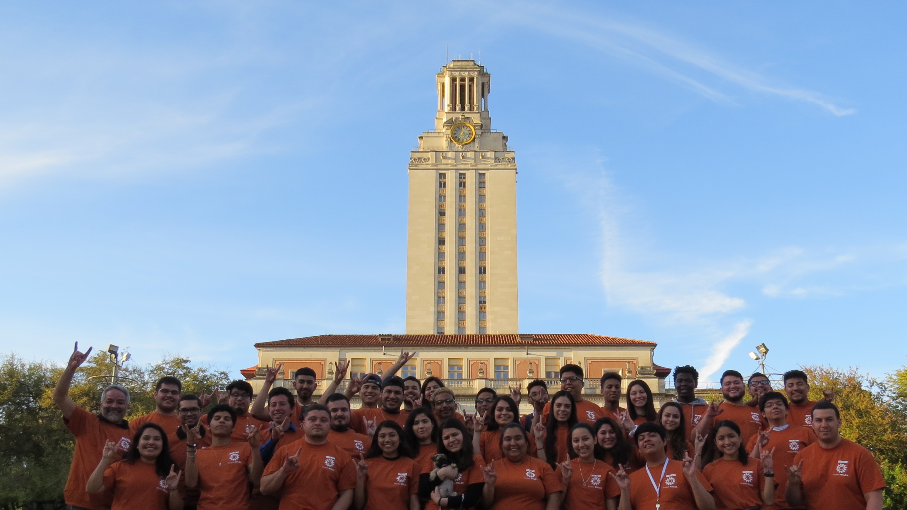 Project MALES mentors in front of the University of Texas tower