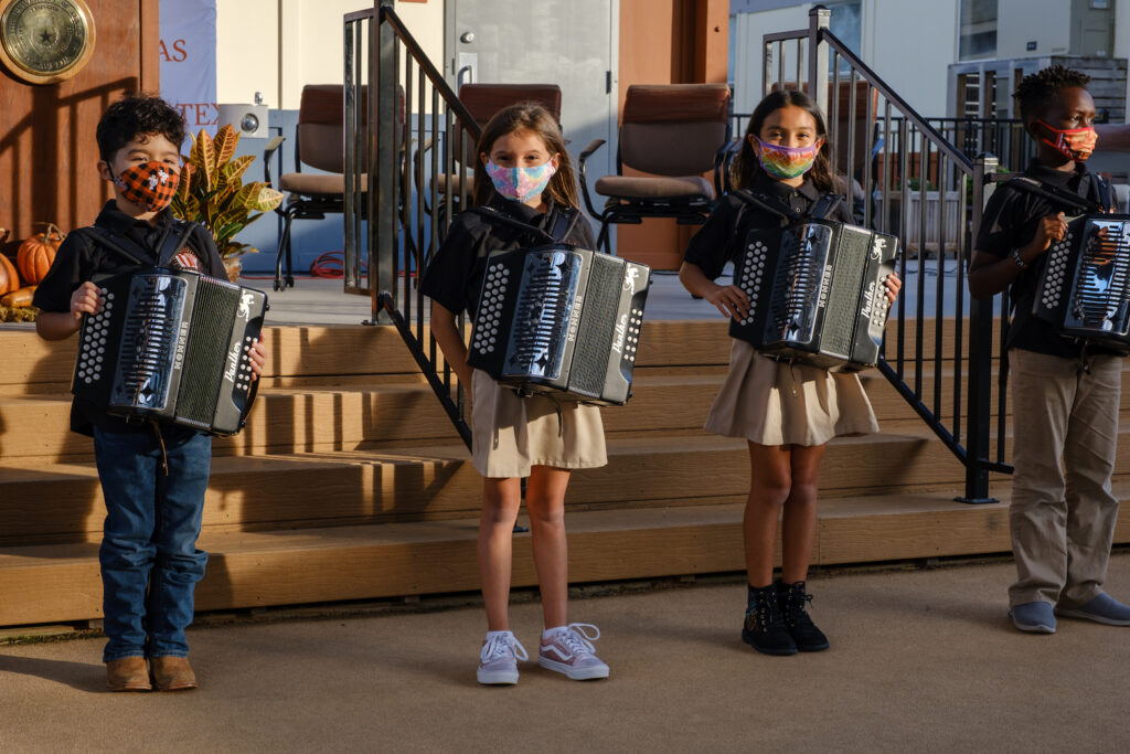 Members of the Little Longhorn Advanced Accordians provide a musical prelude 