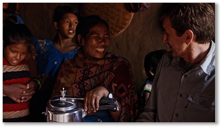  A family in Nepal with an electric cooker, gifted to them by Dr. Tinker