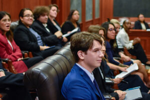 Students in the courtroom at 2023 Explore Law event